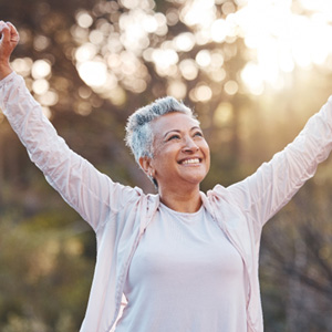 Happy, healthy senior woman enjoying time outdoors