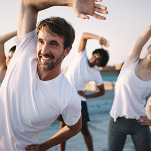 Group of people exercising outdoors